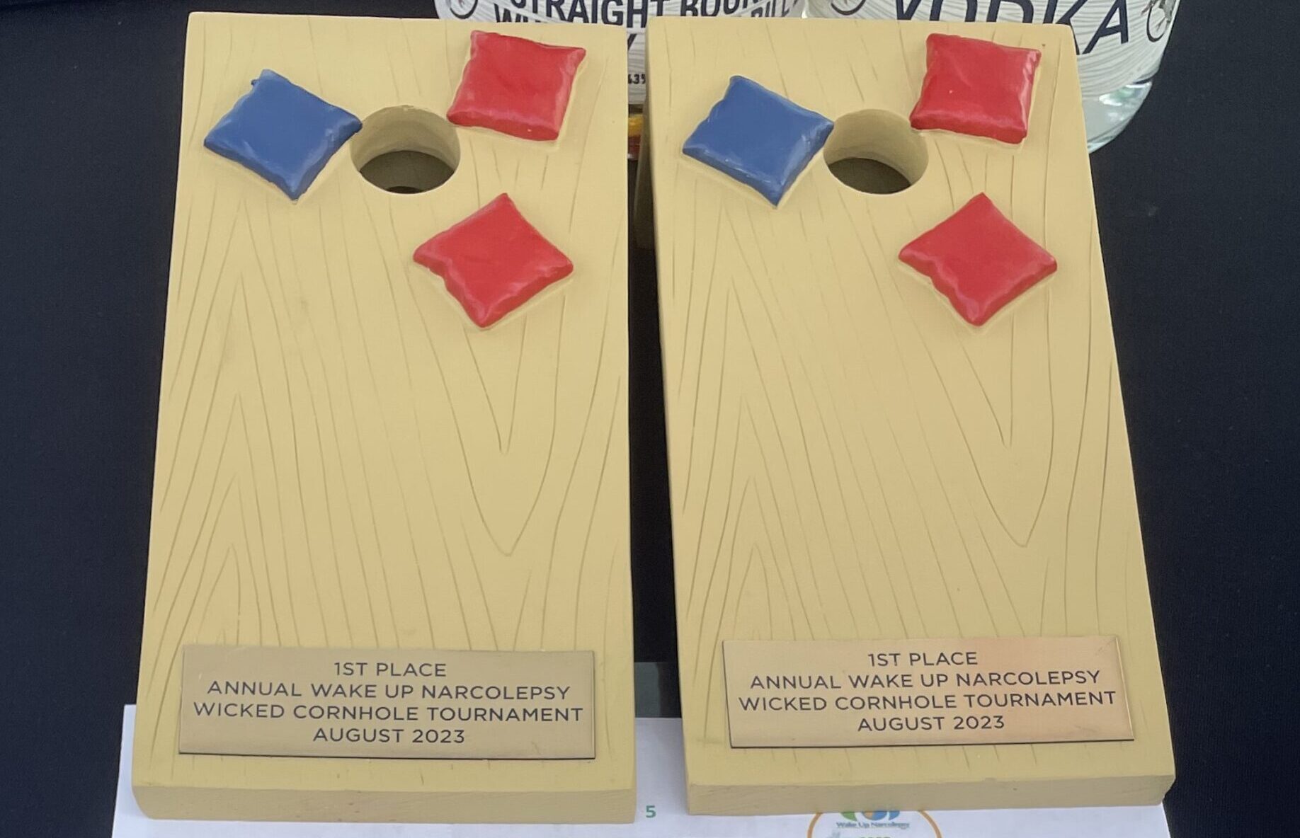Custom Cornhole Trophies shaped like cornhole boards - 1st Place - Annual Wicked Cornhole Tournament Wake Up Narcolepsy 2023